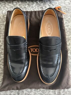 Tod's Black Leather Penny Loafers with Tan Soles